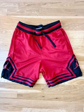 Red Jordan Basketball Shorts with Black Trim